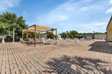 Welcome to 5748 Holiday Park Blvd.  This home is located in the on Sabal Trace Golf and Country Club in Florida - for sale on GolfHomes.com, golf home, golf lot
