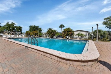 Welcome to 5748 Holiday Park Blvd.  This home is located in the on Sabal Trace Golf and Country Club in Florida - for sale on GolfHomes.com, golf home, golf lot