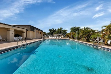 Welcome to 5748 Holiday Park Blvd.  This home is located in the on Sabal Trace Golf and Country Club in Florida - for sale on GolfHomes.com, golf home, golf lot