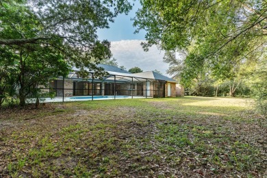 This remarkable, all brick home on 0.55 Acre with a screened on The Club At Hidden Creek in Florida - for sale on GolfHomes.com, golf home, golf lot