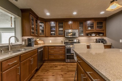 Beautifully updated 4 bedroom, 2 bathroom home in Village Green on Twin Lakes Golf Club in Arkansas - for sale on GolfHomes.com, golf home, golf lot