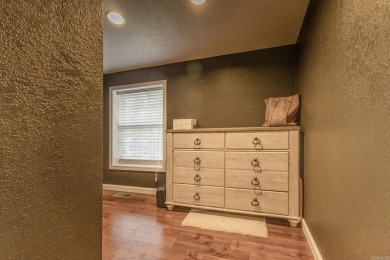Beautifully updated 4 bedroom, 2 bathroom home in Village Green on Twin Lakes Golf Club in Arkansas - for sale on GolfHomes.com, golf home, golf lot