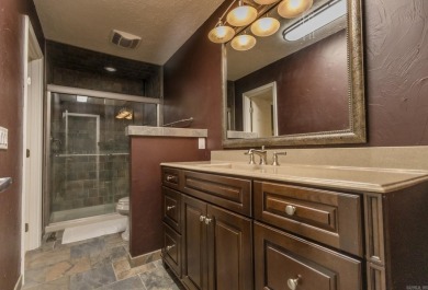Beautifully updated 4 bedroom, 2 bathroom home in Village Green on Twin Lakes Golf Club in Arkansas - for sale on GolfHomes.com, golf home, golf lot