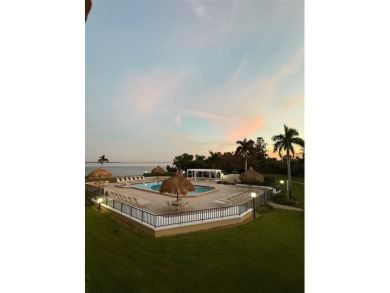 Welcome to Maintenance-Free, Resort-Style Living -- Relax & on Isla Del Sol Yacht and Country Club in Florida - for sale on GolfHomes.com, golf home, golf lot