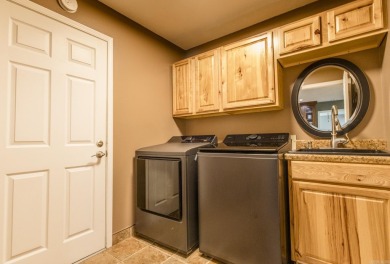 Beautifully updated 4 bedroom, 2 bathroom home in Village Green on Twin Lakes Golf Club in Arkansas - for sale on GolfHomes.com, golf home, golf lot