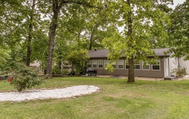 Beautifully updated 4 bedroom, 2 bathroom home in Village Green on Twin Lakes Golf Club in Arkansas - for sale on GolfHomes.com, golf home, golf lot