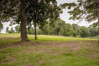 Beautifully updated 4 bedroom, 2 bathroom home in Village Green on Twin Lakes Golf Club in Arkansas - for sale on GolfHomes.com, golf home, golf lot