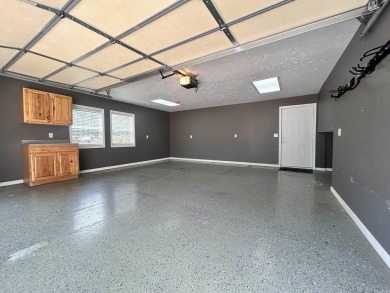 Beautifully updated 4 bedroom, 2 bathroom home in Village Green on Twin Lakes Golf Club in Arkansas - for sale on GolfHomes.com, golf home, golf lot