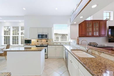 Impeccably appointed pool home on the Bobcat Course, hole #2, in on Plantation Golf and Country Club in Florida - for sale on GolfHomes.com, golf home, golf lot