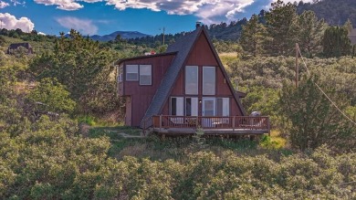 HUGE PRICE IMPROVEMENT AND SELLER IS MOTIVATED! Panoramic views on Hollydot Golf Course in Colorado - for sale on GolfHomes.com, golf home, golf lot