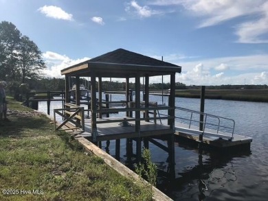 Uncommon riverfront home site in the popular and amenity-rich on Carolina National Golf Club in North Carolina - for sale on GolfHomes.com, golf home, golf lot