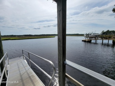 Uncommon riverfront home site in the popular and amenity-rich on Carolina National Golf Club in North Carolina - for sale on GolfHomes.com, golf home, golf lot