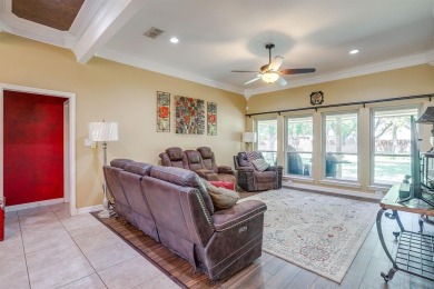 Welcome to this elegant 3-bedroom, 2.5-bath home located in the on Pecan Plantation Country Club in Texas - for sale on GolfHomes.com, golf home, golf lot