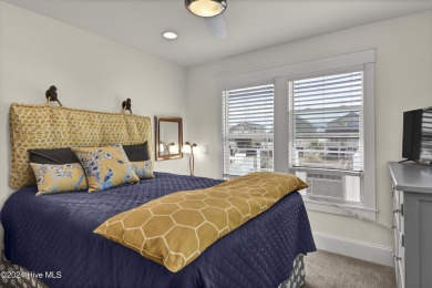Welcome to 25 Newport Street, a breathtaking coastal retreat on Sea Trail Golf Resort in North Carolina - for sale on GolfHomes.com, golf home, golf lot
