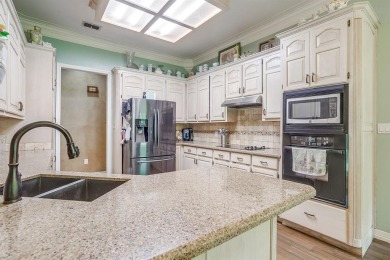Welcome to this elegant 3-bedroom, 2.5-bath home located in the on Pecan Plantation Country Club in Texas - for sale on GolfHomes.com, golf home, golf lot