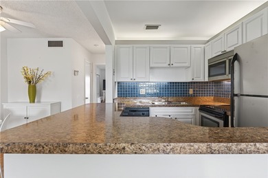 Enjoy carefree Florida living in this clean 1BR/1BA 2nd-floor on The American Golf Club in Florida - for sale on GolfHomes.com, golf home, golf lot