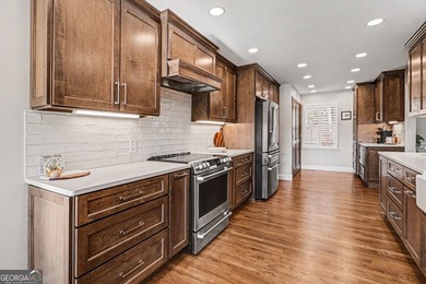 Welcome to your private lakefront retreat-where luxury and on Fairfield Plantation Golf and Country Club in Georgia - for sale on GolfHomes.com, golf home, golf lot