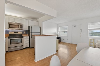 Enjoy carefree Florida living in this clean 1BR/1BA 2nd-floor on The American Golf Club in Florida - for sale on GolfHomes.com, golf home, golf lot