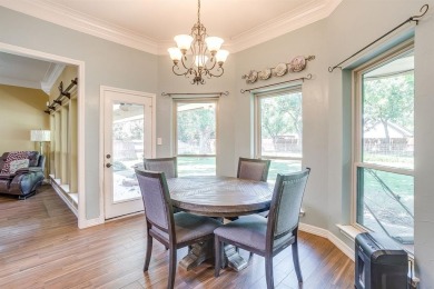 Welcome to this elegant 3-bedroom, 2.5-bath home located in the on Pecan Plantation Country Club in Texas - for sale on GolfHomes.com, golf home, golf lot