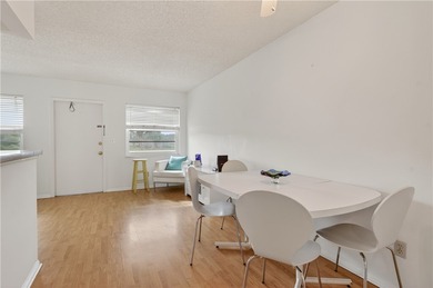 Enjoy carefree Florida living in this clean 1BR/1BA 2nd-floor on The American Golf Club in Florida - for sale on GolfHomes.com, golf home, golf lot