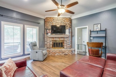 Welcome to this elegant 3-bedroom, 2.5-bath home located in the on Pecan Plantation Country Club in Texas - for sale on GolfHomes.com, golf home, golf lot