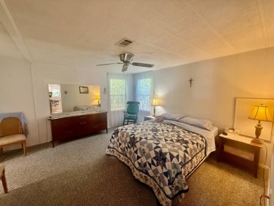 Home is located in Water Oak Country Club Estates in Lady Lake on Water Oak Country Club Estates in Florida - for sale on GolfHomes.com, golf home, golf lot