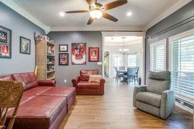Welcome to this elegant 3-bedroom, 2.5-bath home located in the on Pecan Plantation Country Club in Texas - for sale on GolfHomes.com, golf home, golf lot