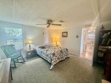Home is located in Water Oak Country Club Estates in Lady Lake on Water Oak Country Club Estates in Florida - for sale on GolfHomes.com, golf home, golf lot
