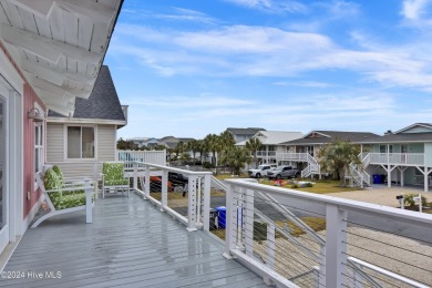 Welcome to 25 Newport Street, a breathtaking coastal retreat on Sea Trail Golf Resort in North Carolina - for sale on GolfHomes.com, golf home, golf lot