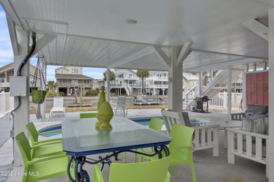 Welcome to 25 Newport Street, a breathtaking coastal retreat on Sea Trail Golf Resort in North Carolina - for sale on GolfHomes.com, golf home, golf lot