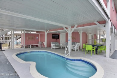 Welcome to 25 Newport Street, a breathtaking coastal retreat on Sea Trail Golf Resort in North Carolina - for sale on GolfHomes.com, golf home, golf lot