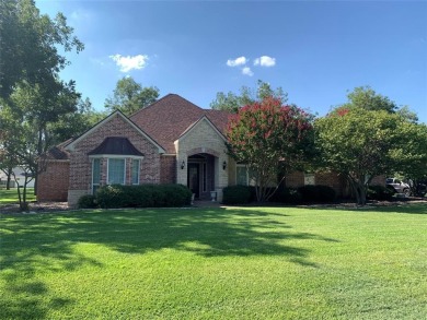 Come tour this home in Pecan Plantation.  The residence offers 3 on Nutcracker Golf Club in Texas - for sale on GolfHomes.com, golf home, golf lot