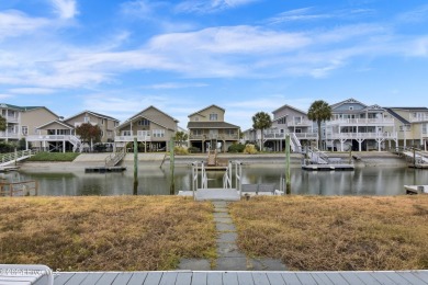 Welcome to 25 Newport Street, a breathtaking coastal retreat on Sea Trail Golf Resort in North Carolina - for sale on GolfHomes.com, golf home, golf lot