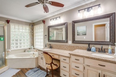 Welcome to this elegant 3-bedroom, 2.5-bath home located in the on Pecan Plantation Country Club in Texas - for sale on GolfHomes.com, golf home, golf lot