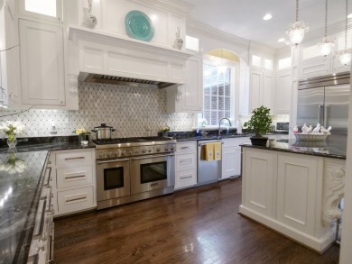 This traditional 1.5 story brick home with finished basement is on The Carolina Country Club in South Carolina - for sale on GolfHomes.com, golf home, golf lot