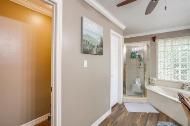 Welcome to this elegant 3-bedroom, 2.5-bath home located in the on Pecan Plantation Country Club in Texas - for sale on GolfHomes.com, golf home, golf lot