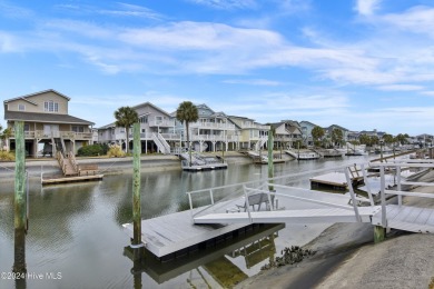 Welcome to 25 Newport Street, a breathtaking coastal retreat on Sea Trail Golf Resort in North Carolina - for sale on GolfHomes.com, golf home, golf lot