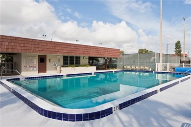 Enjoy carefree Florida living in this clean 1BR/1BA 2nd-floor on The American Golf Club in Florida - for sale on GolfHomes.com, golf home, golf lot
