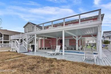 Welcome to 25 Newport Street, a breathtaking coastal retreat on Sea Trail Golf Resort in North Carolina - for sale on GolfHomes.com, golf home, golf lot