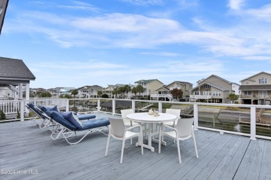 Welcome to 25 Newport Street, a breathtaking coastal retreat on Sea Trail Golf Resort in North Carolina - for sale on GolfHomes.com, golf home, golf lot