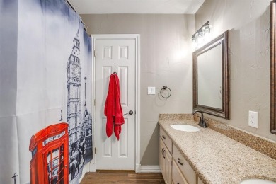 Welcome to this elegant 3-bedroom, 2.5-bath home located in the on Pecan Plantation Country Club in Texas - for sale on GolfHomes.com, golf home, golf lot