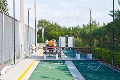 Enjoy carefree Florida living in this clean 1BR/1BA 2nd-floor on The American Golf Club in Florida - for sale on GolfHomes.com, golf home, golf lot