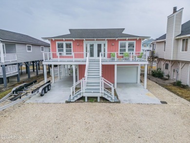 Welcome to 25 Newport Street, a breathtaking coastal retreat on Sea Trail Golf Resort in North Carolina - for sale on GolfHomes.com, golf home, golf lot
