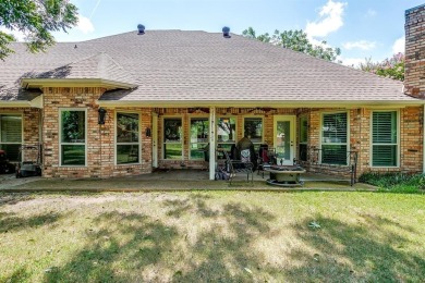 Welcome to this elegant 3-bedroom, 2.5-bath home located in the on Pecan Plantation Country Club in Texas - for sale on GolfHomes.com, golf home, golf lot