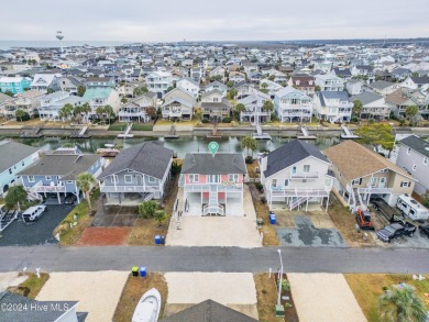 Welcome to 25 Newport Street, a breathtaking coastal retreat on Sea Trail Golf Resort in North Carolina - for sale on GolfHomes.com, golf home, golf lot