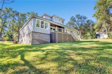 Nestled on nearly  3/4  of an acre, this stunning 4-bedroom, 3 on Rock Creek Golf Club in Alabama - for sale on GolfHomes.com, golf home, golf lot