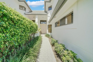 Welcome home to Breakers West! This stunningly renovated 3 BR, 2 on Mayacoo Lakes Country Club in Florida - for sale on GolfHomes.com, golf home, golf lot