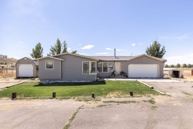 Check out 381 Oakshire Dr.! This home sits on a corner lot on Spring Creek Golf Course in Nevada - for sale on GolfHomes.com, golf home, golf lot
