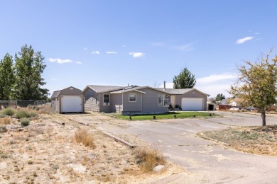 Check out 381 Oakshire Dr.! This home sits on a corner lot on Spring Creek Golf Course in Nevada - for sale on GolfHomes.com, golf home, golf lot