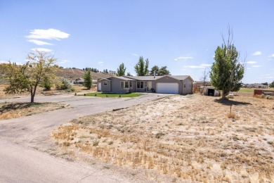 Check out 381 Oakshire Dr.! This home sits on a corner lot on Spring Creek Golf Course in Nevada - for sale on GolfHomes.com, golf home, golf lot